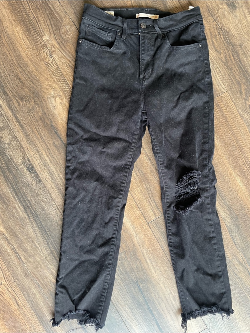 Levi's Black Skinny Jeans with Distressed Knee and Frayed Hem